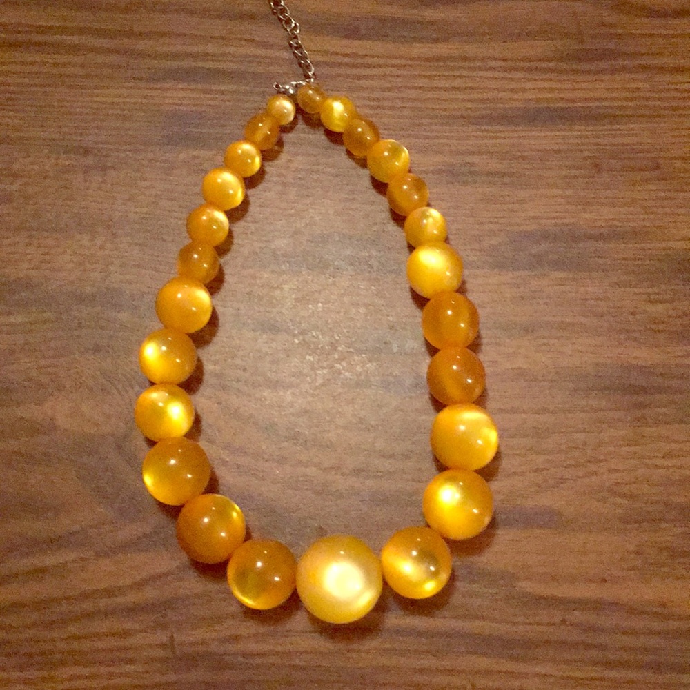 Unique gold beaded necklace